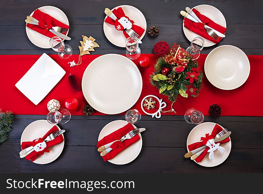 Prepared Christmas table for serving dishes.