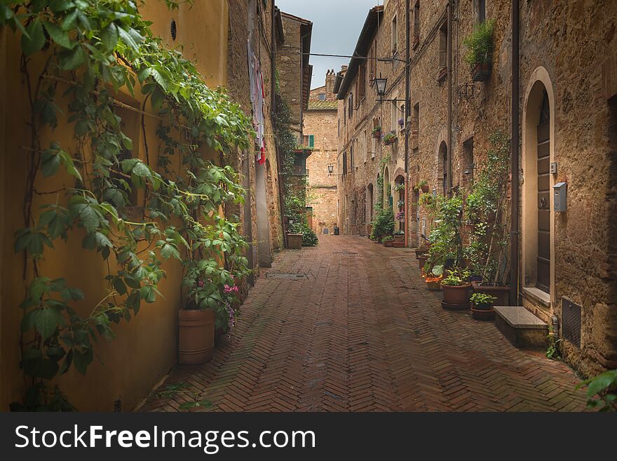 Beautiful and colorful streets of the small and historic Tuscan village Pienza