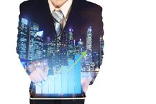 Free Double Exposure Of Businessman Using Tablet With Growth Financial Graph Chart And Building Background. Royalty Free Stock Photography - 129419357