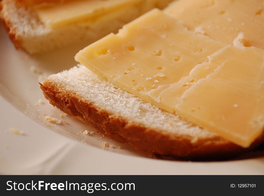 Close macro image of bread with cheese on it