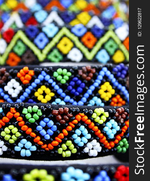 South Africa, Zulu beads are traditionally worn, often used as symbols or love letters