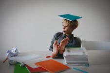 Young Boy Pretend Doing Homework Relaxed At Home Stock Photos