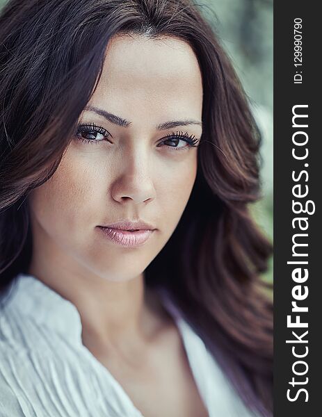 Fashion portrait of amazing brunette woman close up.