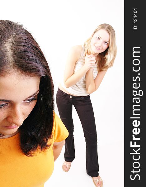 Two girls in portrait, one begging for front position. Two girls in portrait, one begging for front position