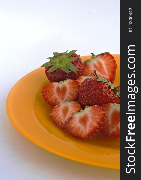 Strawberries on plate.