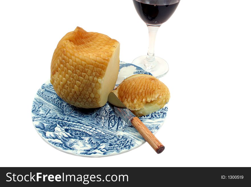 Wine and cheese on a plate. Wine and cheese on a plate