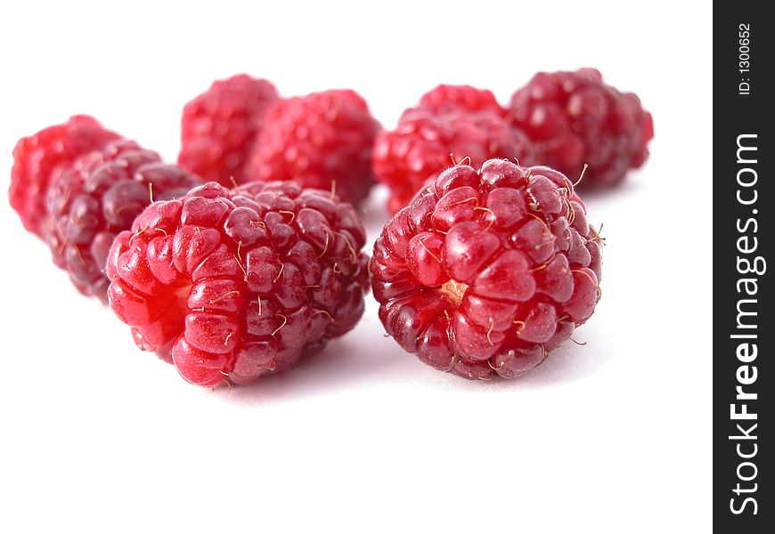 Delicious raspberries on a white back ground. Delicious raspberries on a white back ground