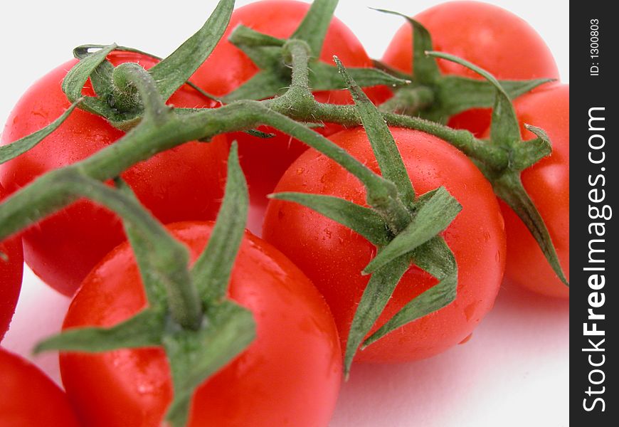Tomatoes against a white background - ready to eat