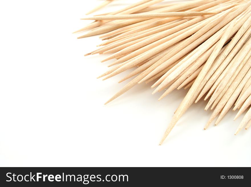 Wooden toothpicks on a white background