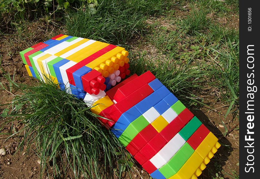 Colors toy blocks in the garden