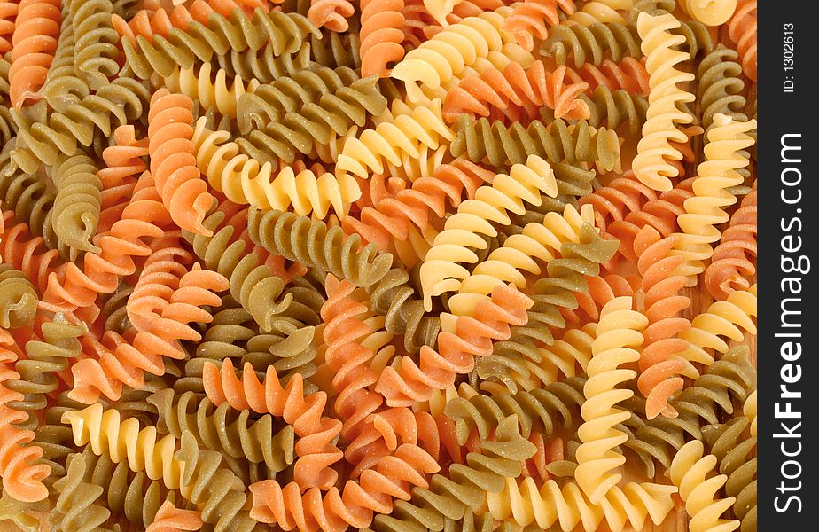 Dried tri-colored fusilli pasta