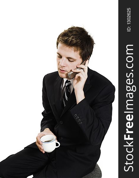 Business man on cell phone over white