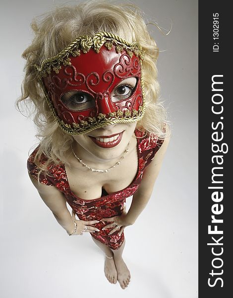 Blond girl in red mask