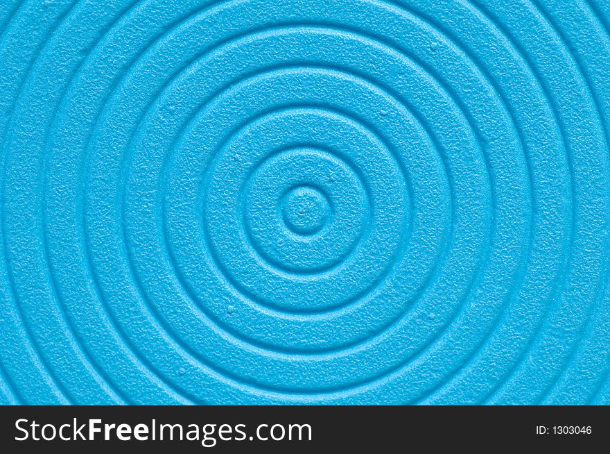 Close up of a blue spiral background.