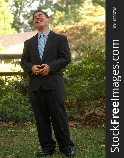 Young man in site laughing