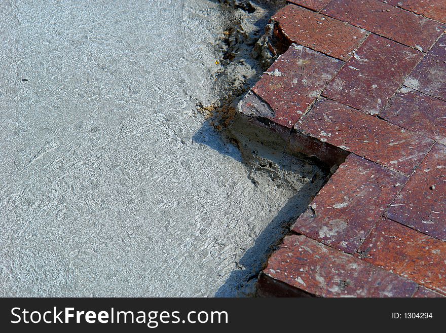 Zig zag of bricks laid on top of cement. Zig zag of bricks laid on top of cement