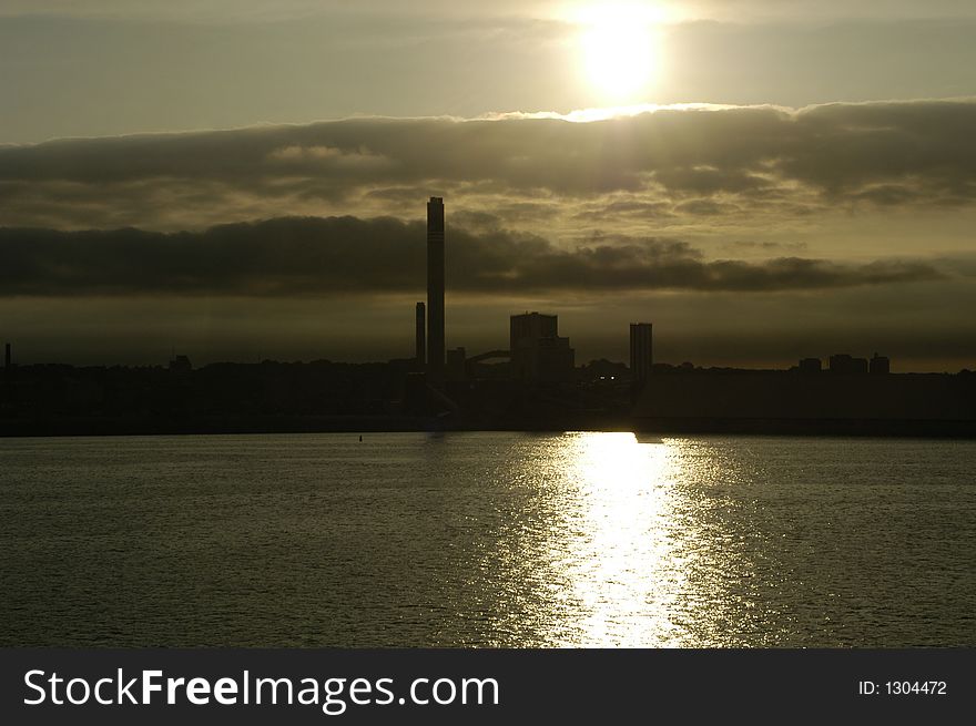 Industrial area - view from sea, silhouette