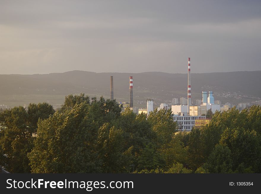 Industrial area - factory surrounded by trees.