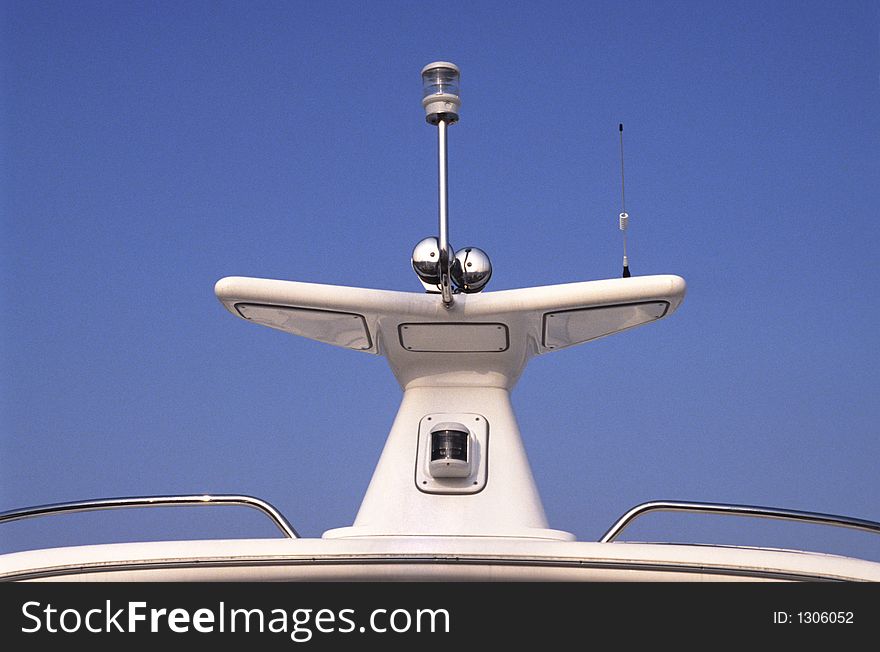 Top of a cruise ship showing radar, alarms and antenna. Top of a cruise ship showing radar, alarms and antenna.