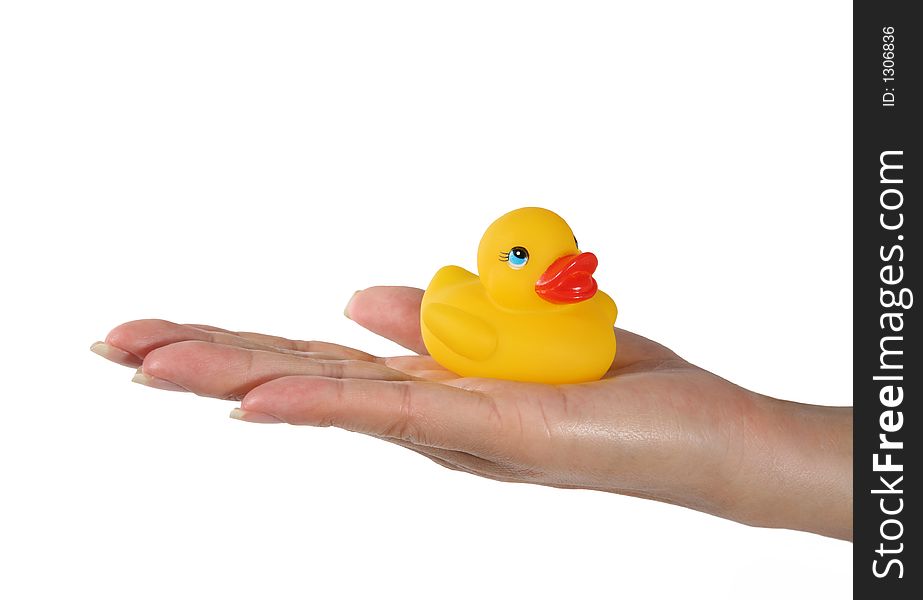 A woman holding a cute yellow plastic duck