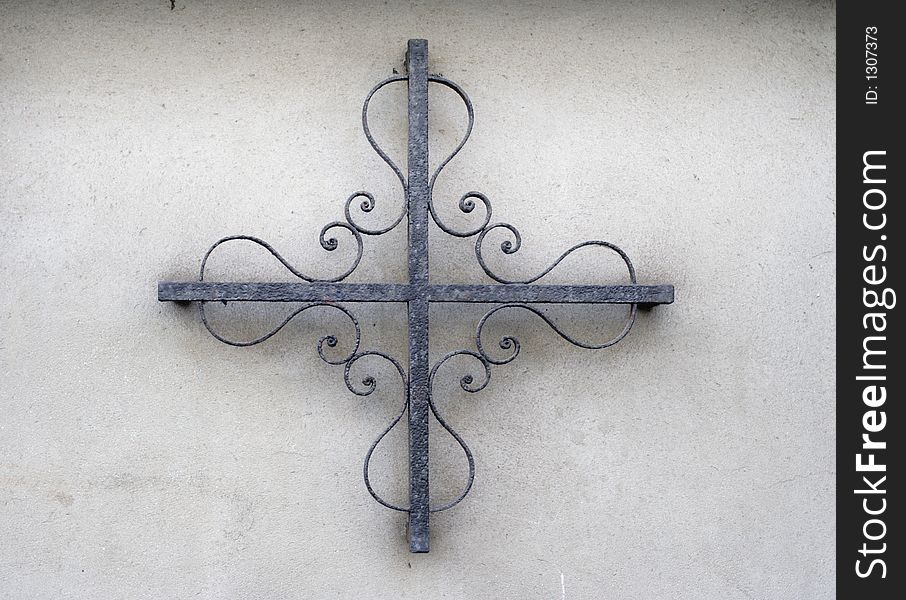 Ornate iron pattern on wall