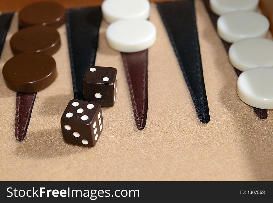 Close up of Backgammon Board and dice in-play. Close up of Backgammon Board and dice in-play