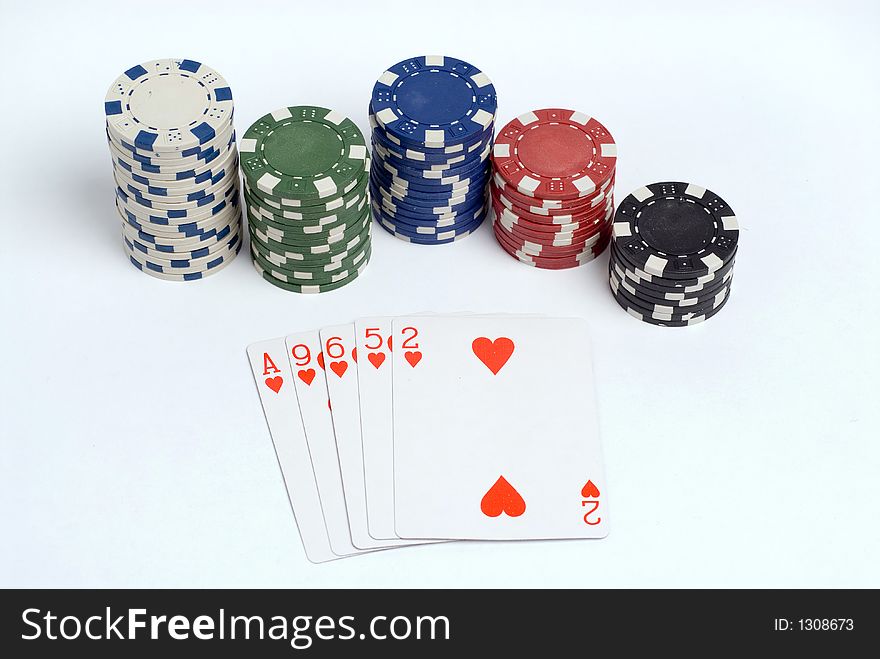 Flush poker hand with chips.