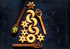 Christmas Tree Made From Cookies And Wooden Spoons With Spices On Black Background. The Concept Of Celebration And Cooking. N Royalty Free Stock Photo Christmas Tree Made From Cookies And Wooden Spoons With Spices On Black Background. The Concept Of Celebration And Cooking. N Royalty Free Stock Photo