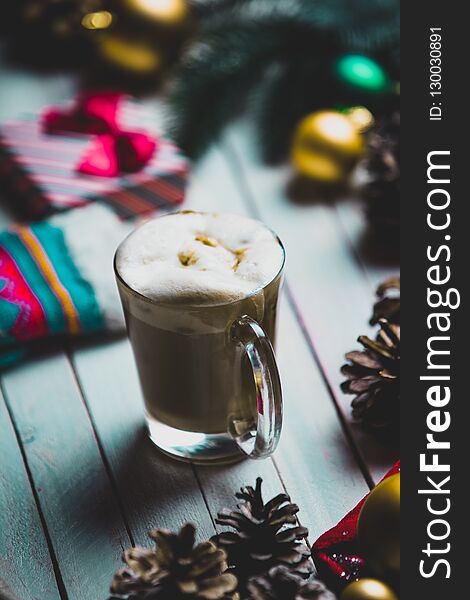Christmas decorations, gift, sock and cup of coffee