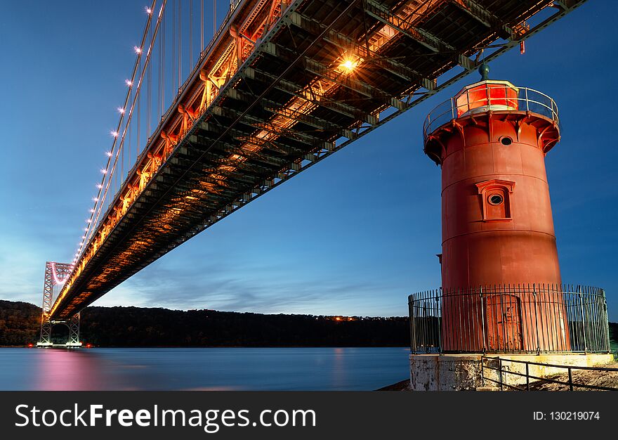 George Washington Bridge and Red Little Lighthouse officially Jeffrey`s Hook Light, New York, USA