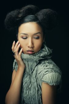 Beauty And Fashion Concept: Young Asian Fashion Model In Grey Dress Royalty Free Stock Image