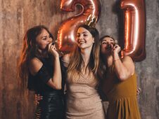 Group Of Women With Fireworks At Party Having Fun. Royalty Free Stock Photography