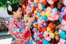Girl Hanging Praying Ball On Blessing Wall Stock Photography Girl Hanging Praying Ball On Blessing Wall Stock Photography