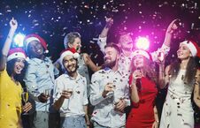 Happy Friends Dancing At New Year Party Stock Image