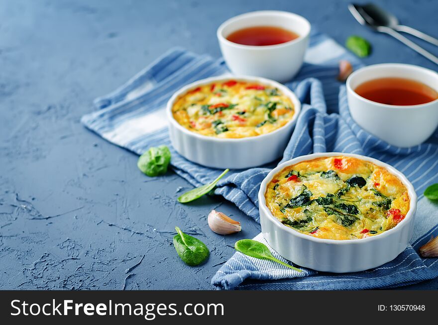 Spinach Red Bell Pepper Baked Omelet with cups of tea and fresh