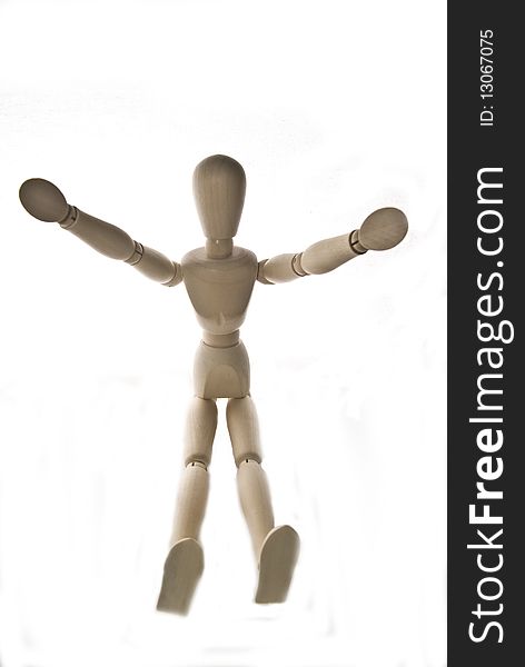 Wooden figure with a white back ground. Wooden figure with a white back ground