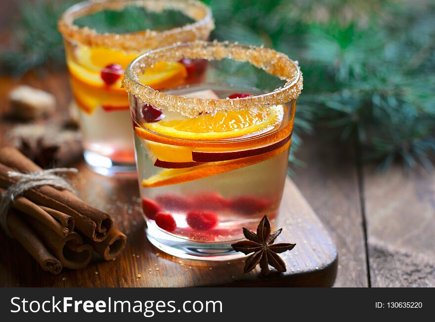 Winter Cocktail, Christmas Sangria with Apple Slices, Orange, Cranberry and Cinnamon, Refreshing Drink