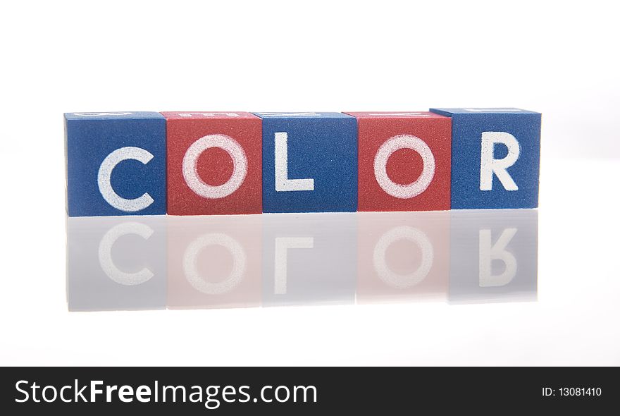Colored alphabetical cubes presenting words