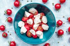 Italian Food Ingredients - Mozzarella, Tomatoes On Concrete. View From Above Royalty Free Stock Image