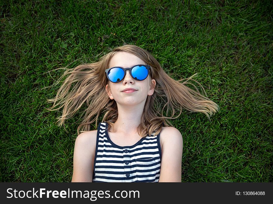 Happy girl in sunglasses