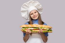 Free Happy Little Girl With Hot Dog And Chef Uniform Isolated On White Background Stock Image - 130964811