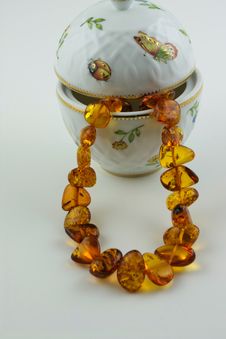Amber Treasure - Necklace And China Vase Stock Photos