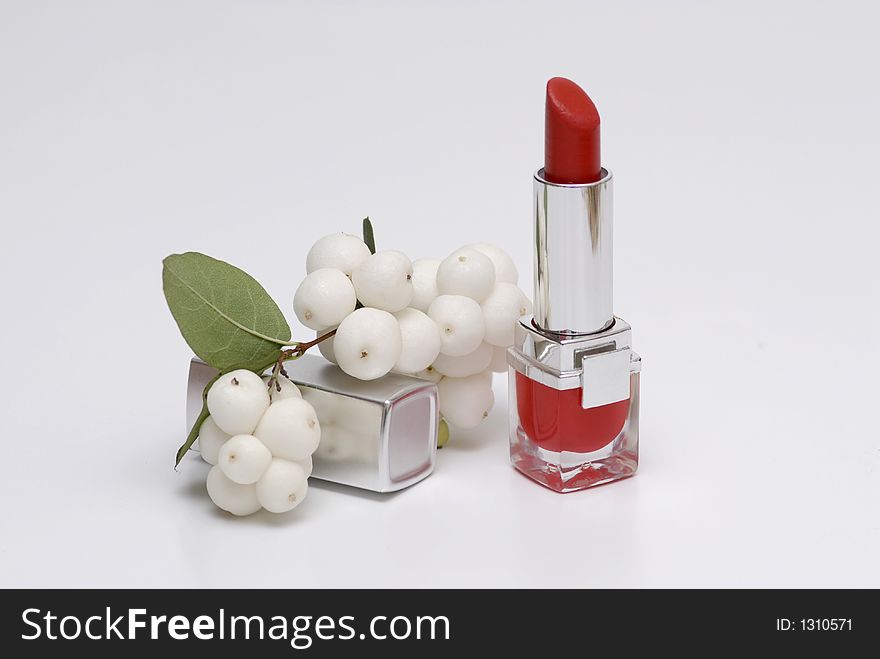 A red lipstick on white background