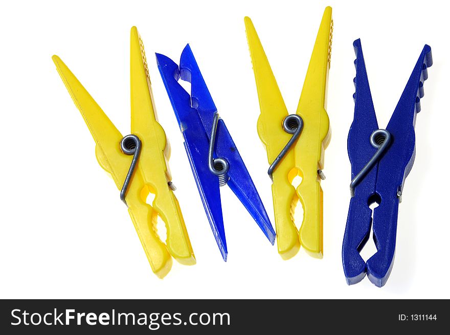 Colourful pegs on white background. Colourful pegs on white background