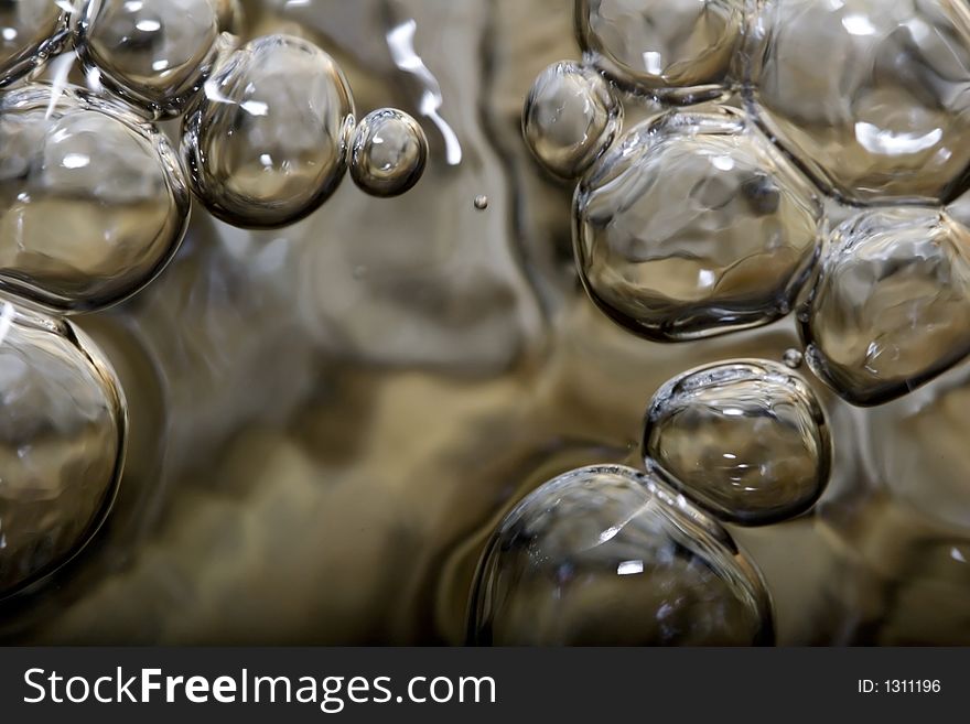 Moving water bubbles in a creek. Moving water bubbles in a creek