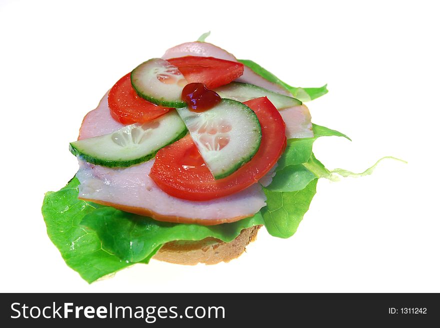 Fresh sandwich with salat, ham, tomato and cucumber. Fresh sandwich with salat, ham, tomato and cucumber