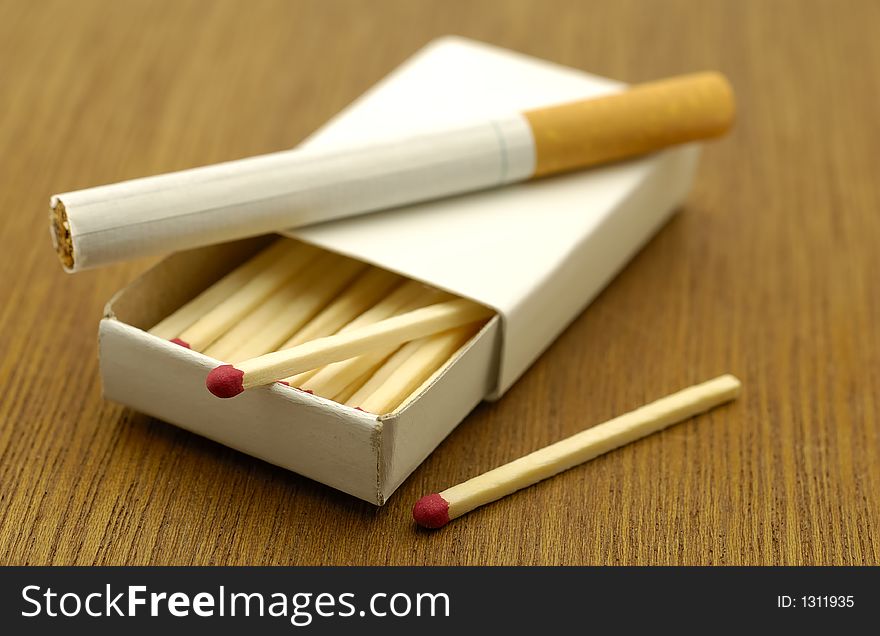 Photo of Matches and a Cigarette. Photo of Matches and a Cigarette