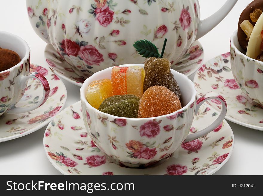 Afternoon tea with candy and chocolates close-up