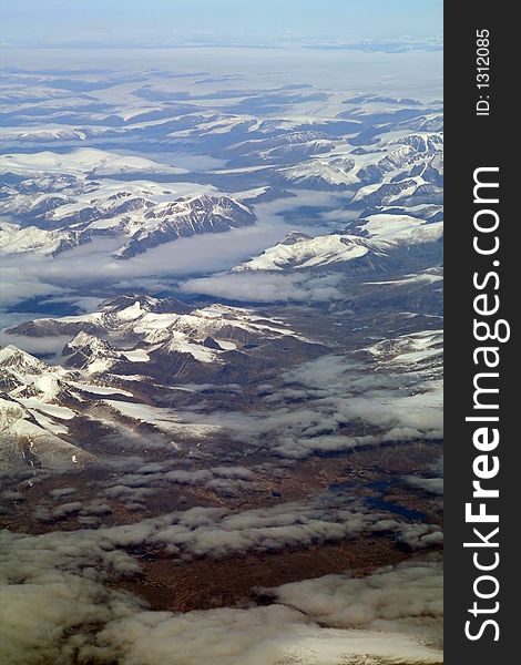 Cloud covered mountains landscape, aerial view