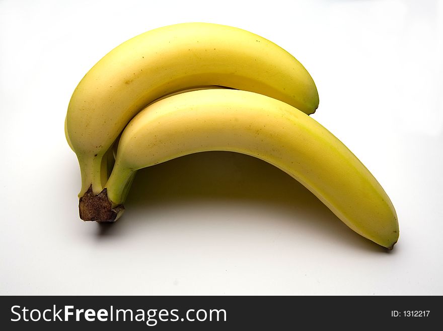 Bunch of bananas on a white studio background.